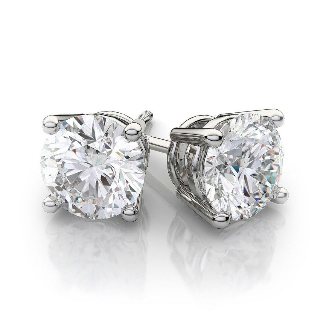 0.25ct tcw Four Prong Round Diamond Stud Earring in 14KW